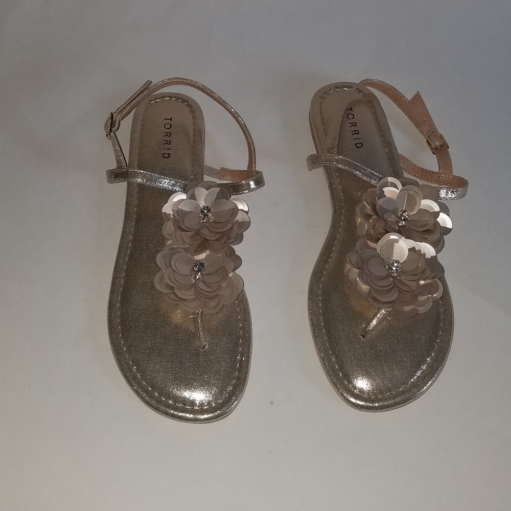 Torrid sandles. Gold tone. Floral top. Size 10